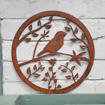 Rusted Metal Bird On Branch In Circular Frame